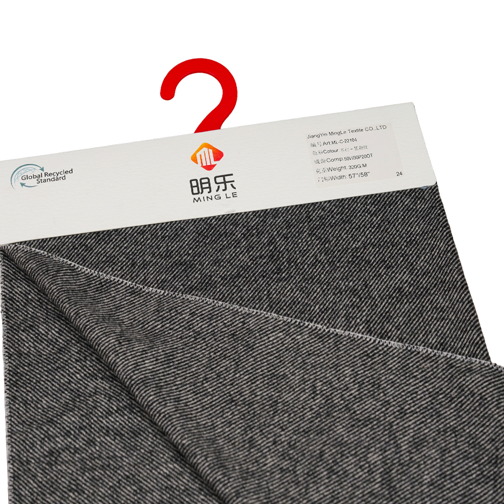 50% gyapjú, 30% poliészter, 20% egyéb szál, 320 G/M, törtfehér + fekete, twill flanel anyag, ML-C-22104